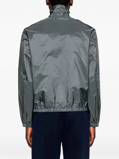 Giubbino Grigio Acciaio in Nylon Placchetta Logo Prada