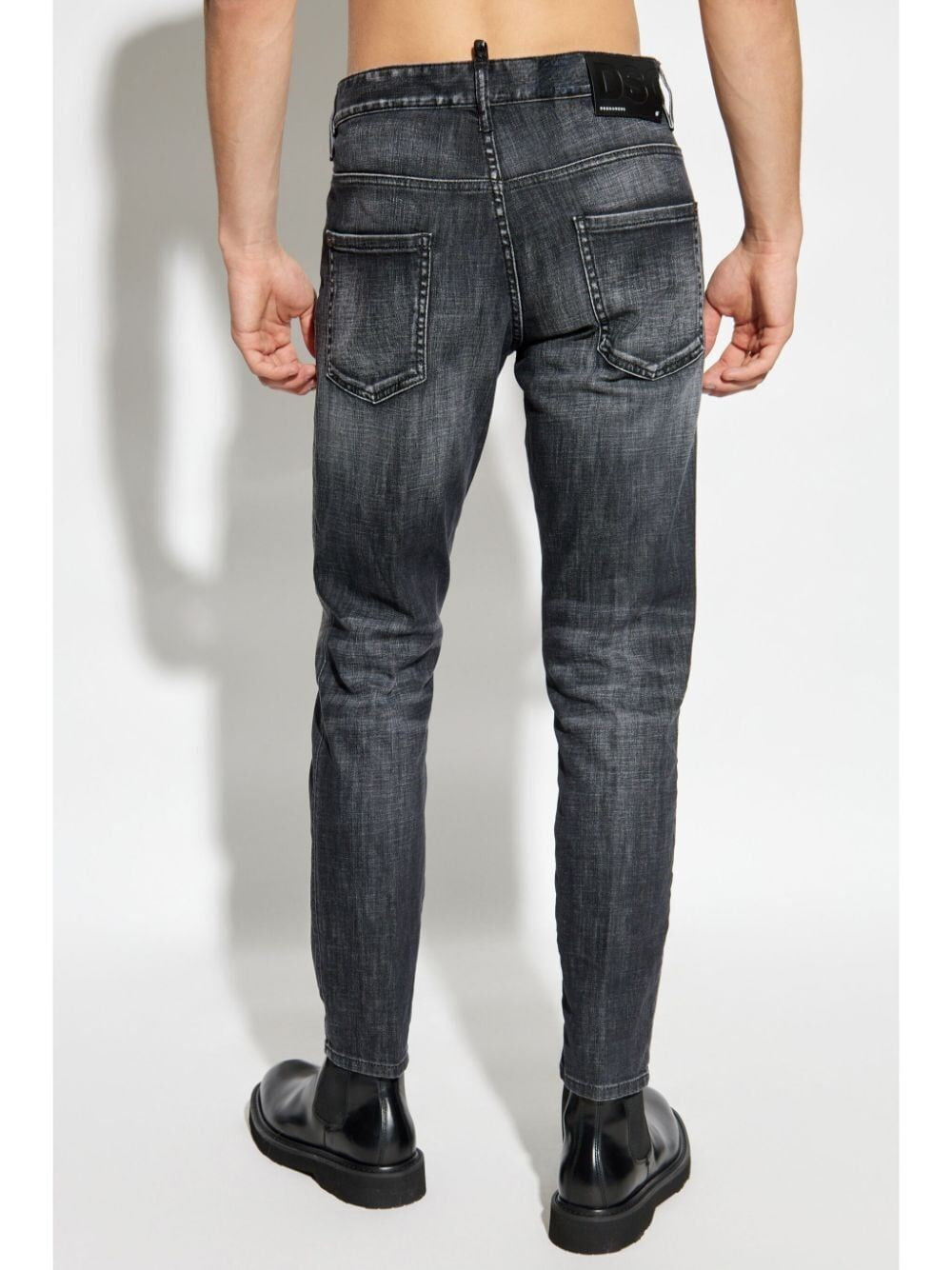 JEANS IN DENIM NERO STRAPPATO DSQUARED